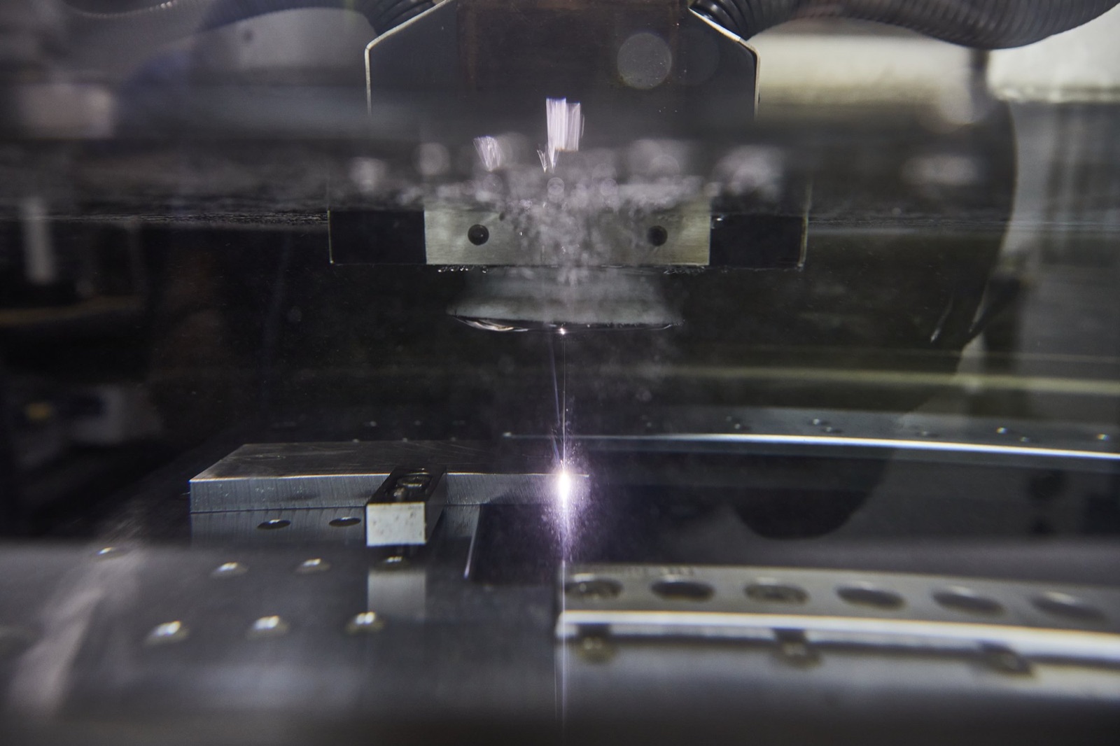 Wire-EDM machine cutting an extrusion die